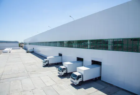 Property Image-stock facade of an industrial building and warehouse with freight cars in length.jpg